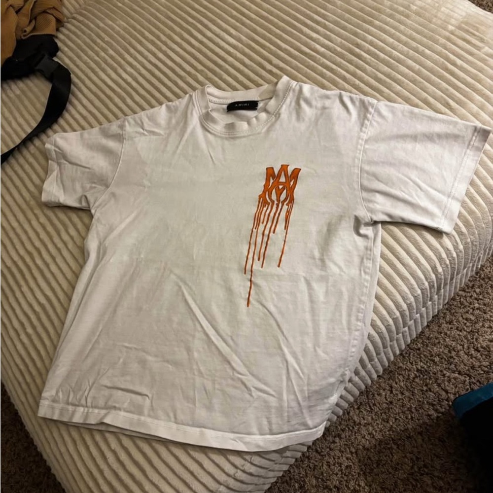 AMIRI White Tee with Orange Drip Design